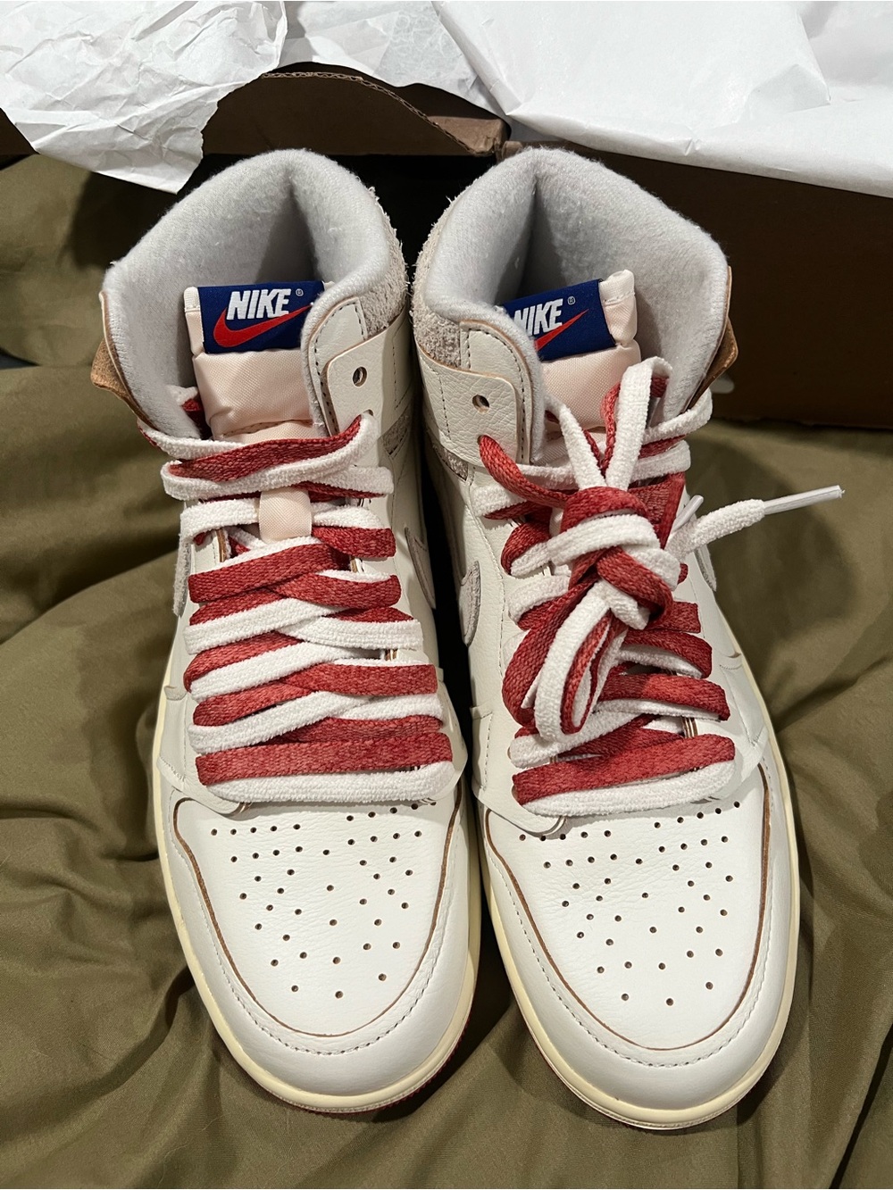 Nike White High-Top Sneakers with Red and Blue Accents